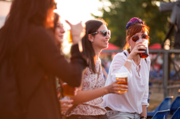 a group of friends tasting beer at one of the festivals near Lone Tree